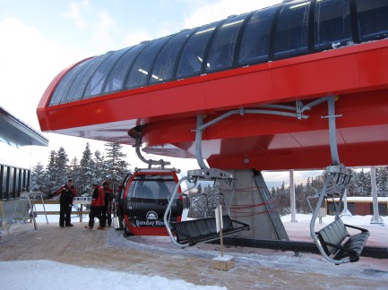 There are 4 chairs for every gondola cabin.