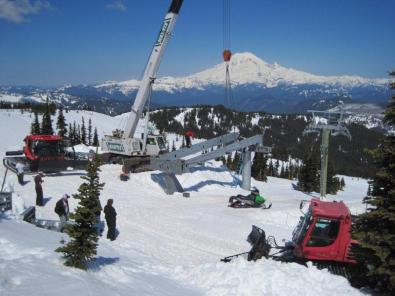 Building lifts over snow in 2010 with a unique construction schedule due to environmental concerns.