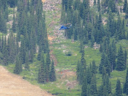 Brian Jorgenson from Timberline Helicopters flies concrete for the new Teton Lift  earlier this week.